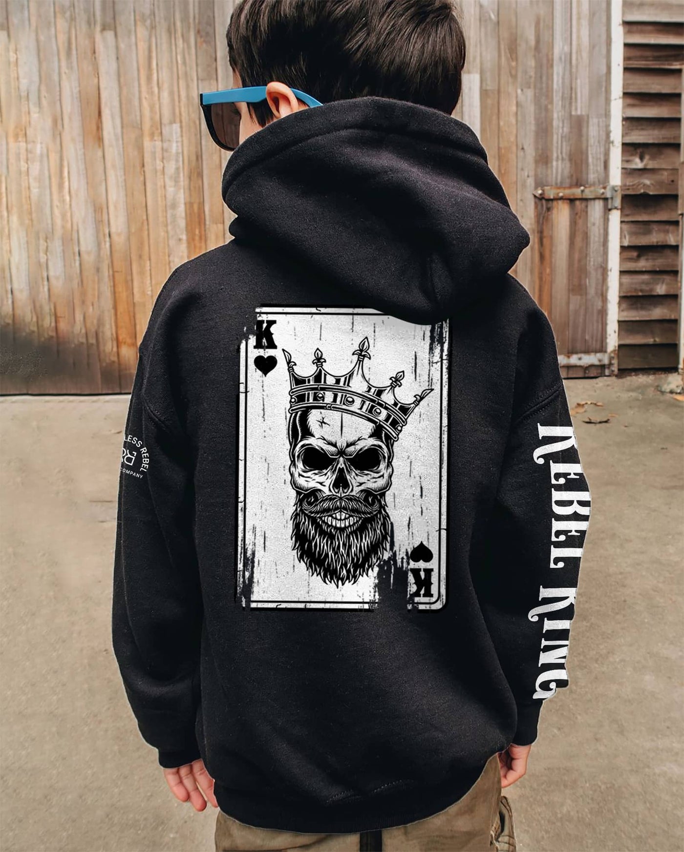 Boy wearing Solid Black Youth Rebel King - Ace Sleeve and Back Design Hoodie