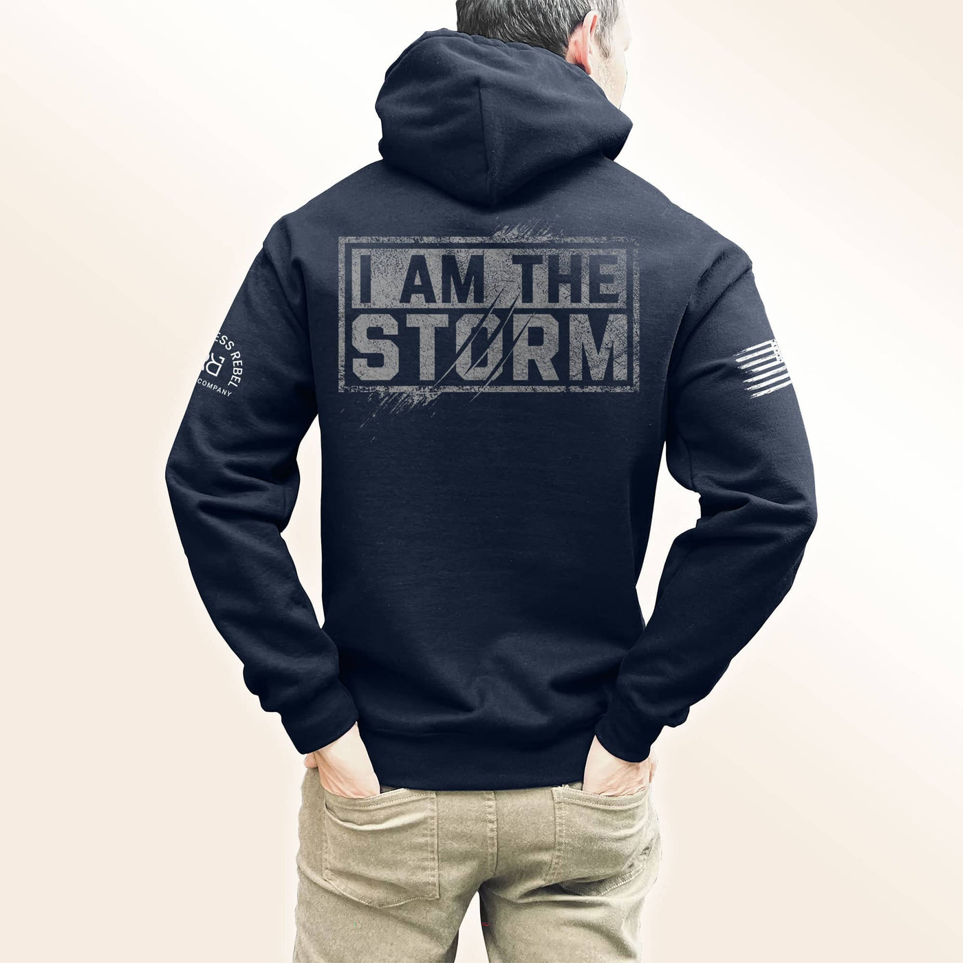 Man wearing Navy I Am The Storm Men's Back Design Heavyweight Hoodie