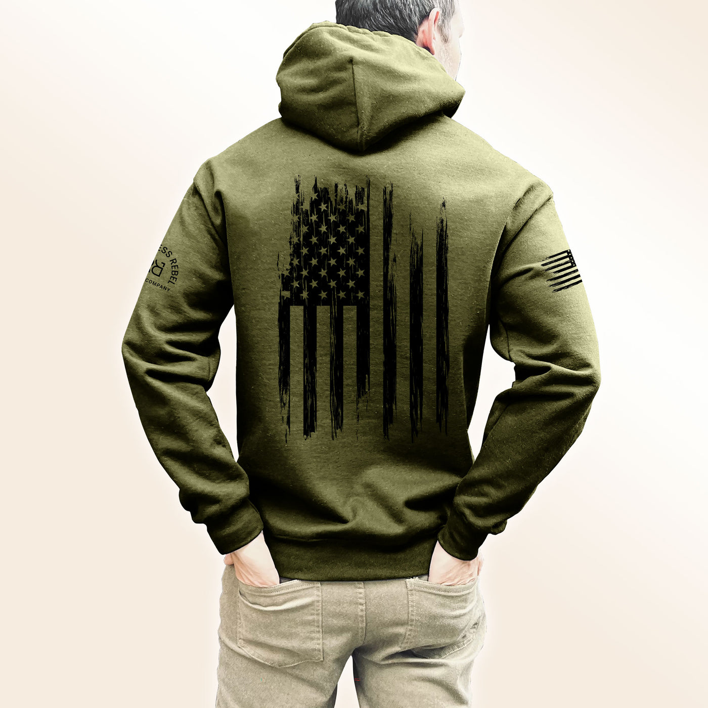 Man wearing Military Green Men's Rebel Patriot Flag Back Design Hoodie