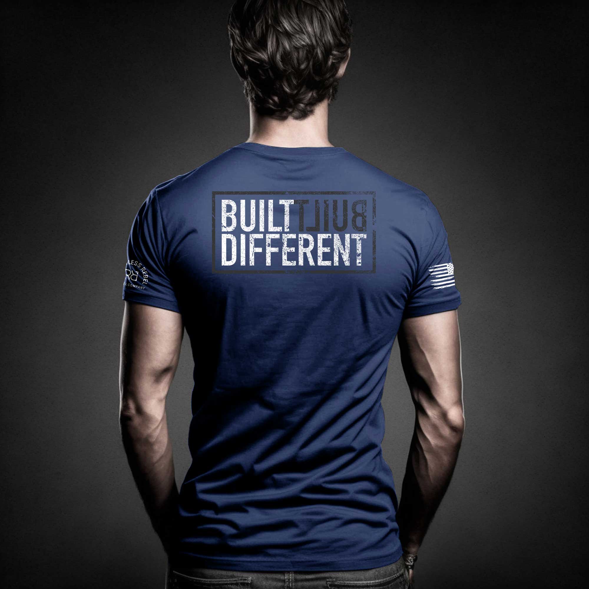 Man wearing Built Different back design t-shirt
