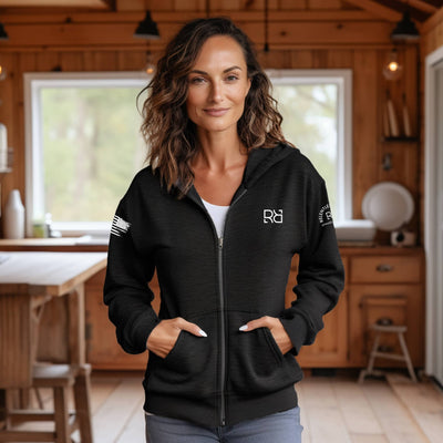 Woman wearing Solid Black We are Not the Same | Men's Lightweight Zip Hoodie