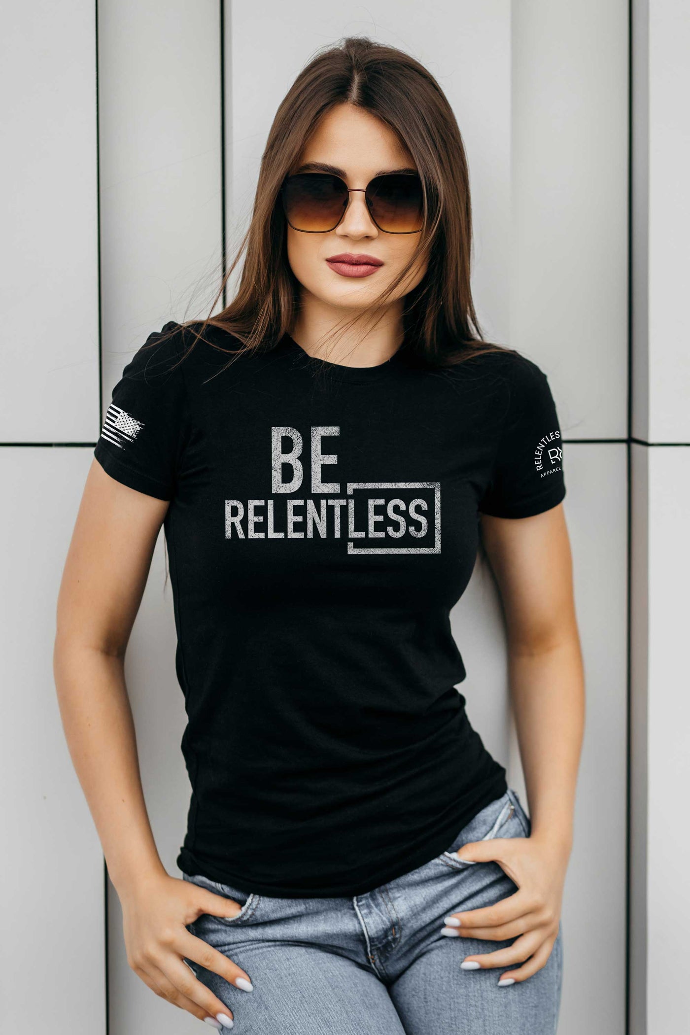 Woman wearing Solid Black Women's Be Relentless Front Design Tee