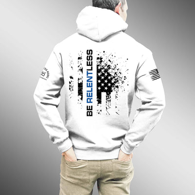 White hoodie with graphic design on the back, worn by a person against a gray background