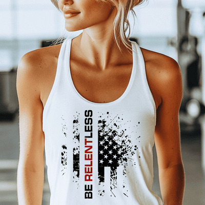 Woman wearing a white tank top with a graphic design and text.