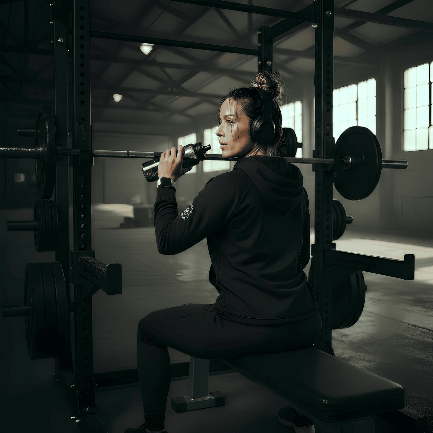 Person lifting weights in a gym setting