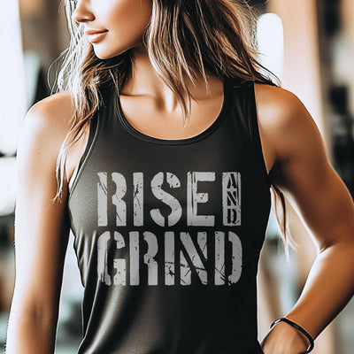 Person wearing a black tank top with 'Rise and Grind' text in a gym setting