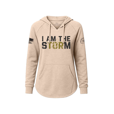 Blush hoodie with 'I AM THE STORM' text on a white background
