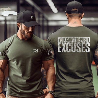 Two men wearing green t-shirts, one with a logo on the front and the other with motivational text on the back.