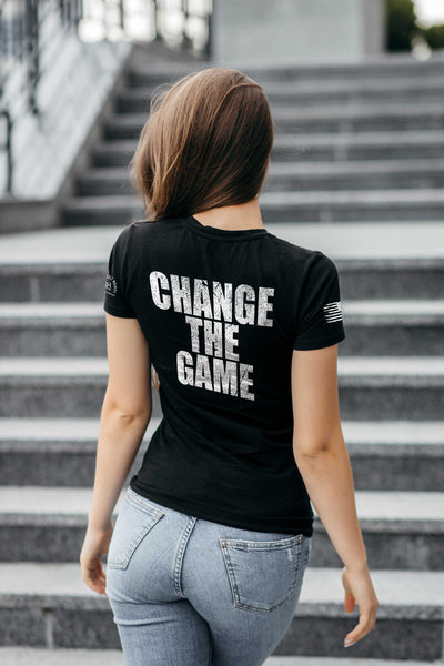 Woman wearing Solid Black Women's Change the Game Back Design Tee