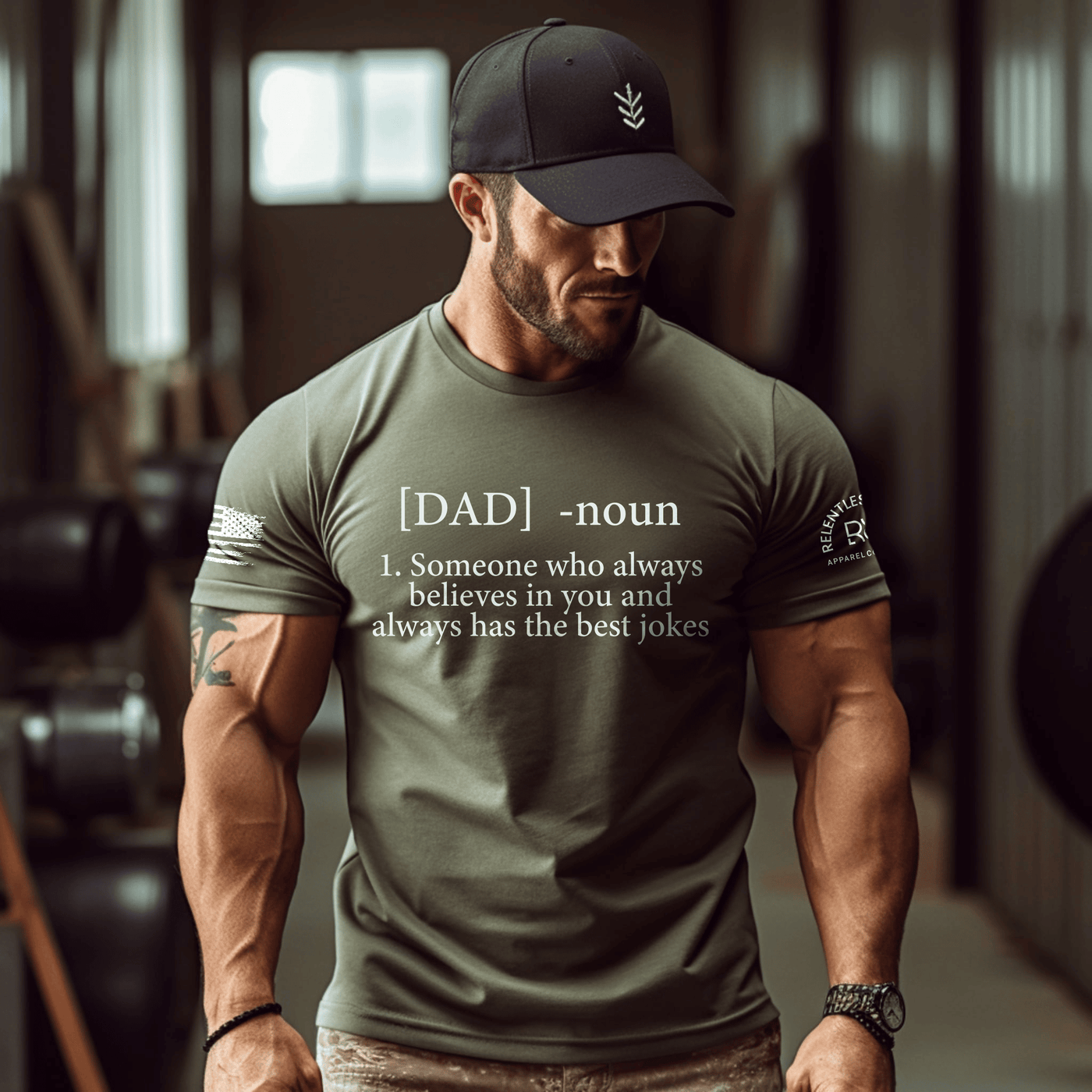 Man wearing a green t-shirt with text in a gym setting