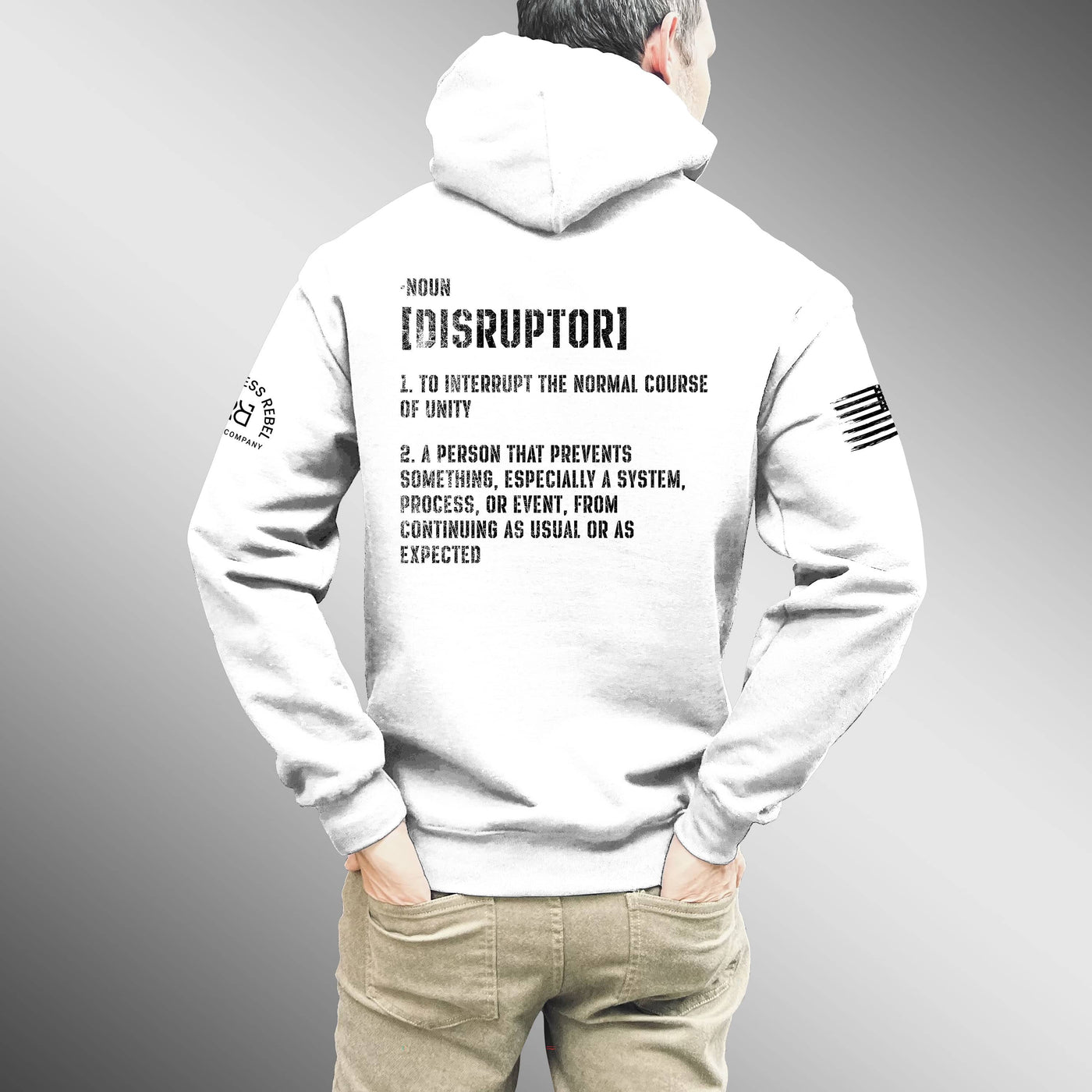 Person wearing a white hoodie with text on the back, standing against a gray background