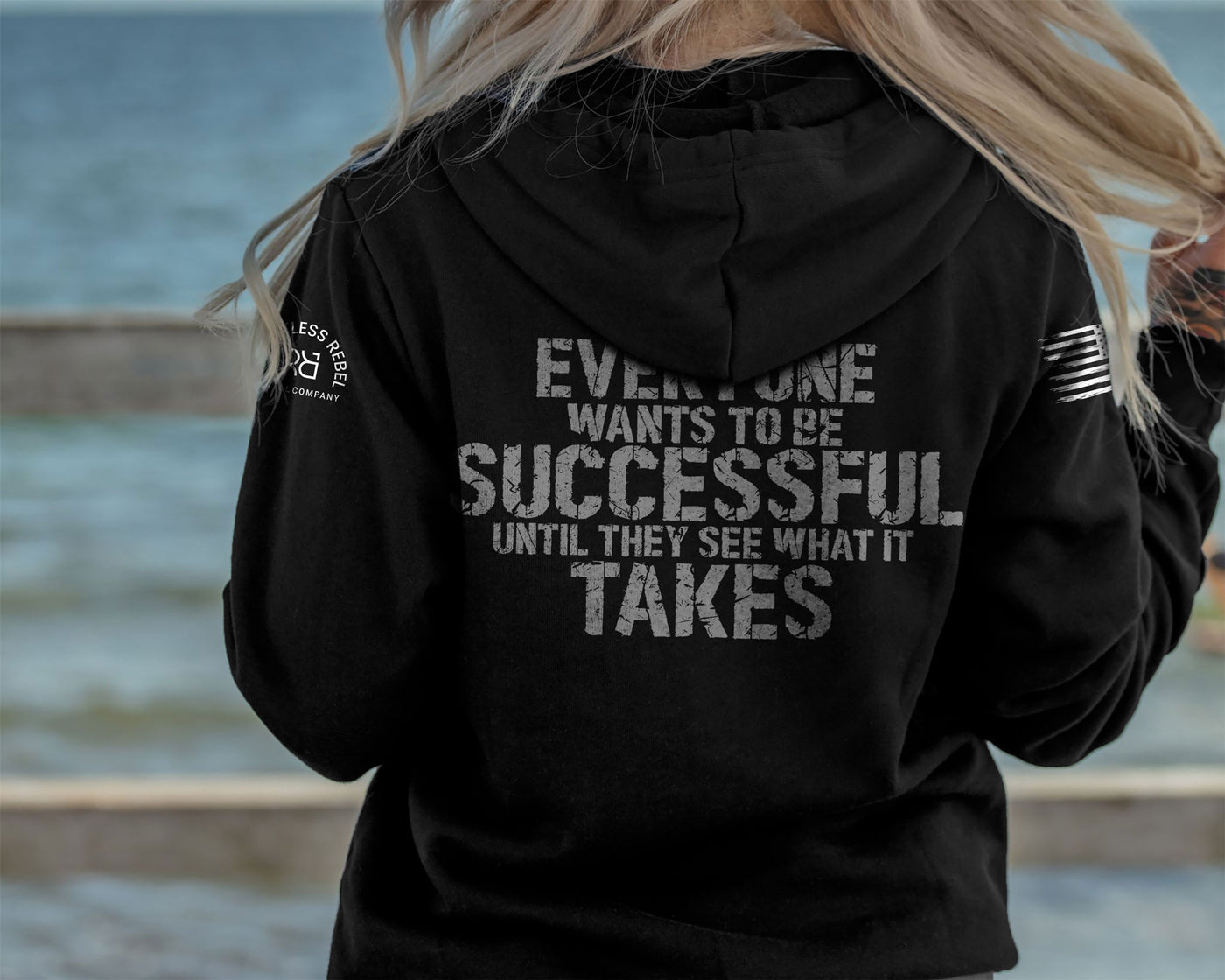 Woman wearing Solid Black Women's Everyone Wants to Be Successful Back Design Hoodie