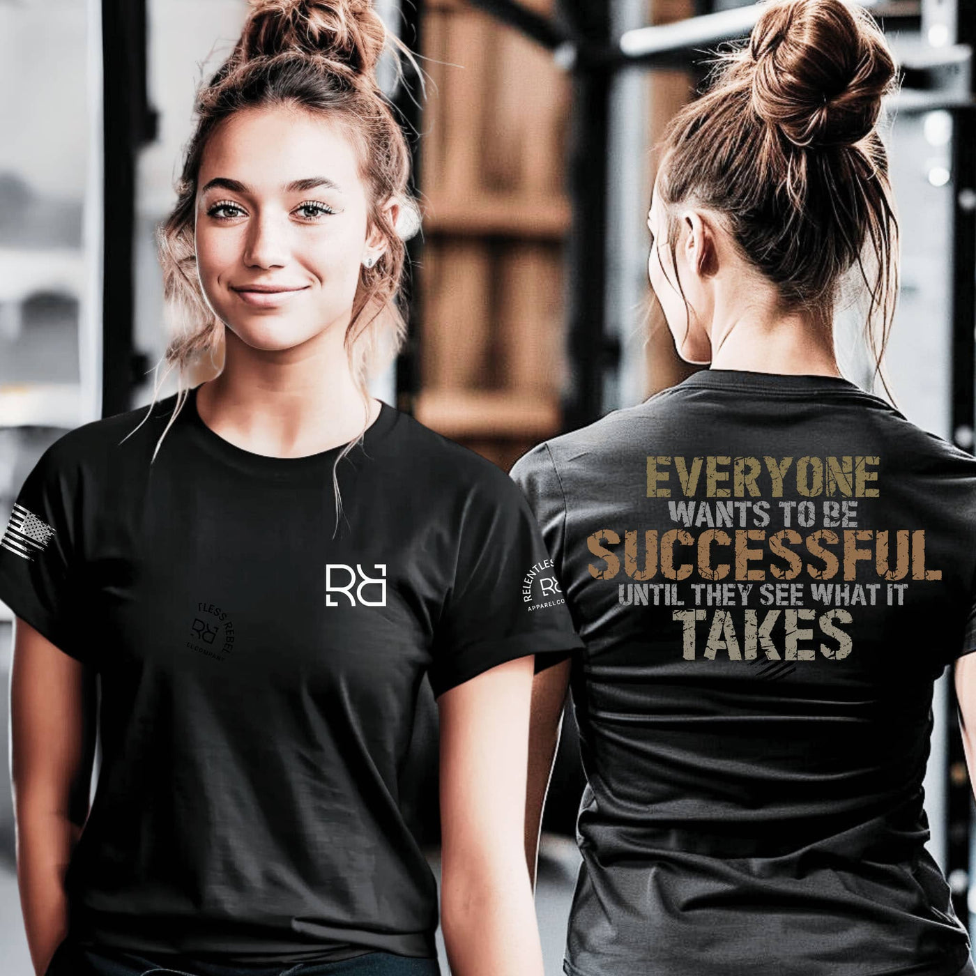 Two people wearing black t-shirts with a motivational quote on the back, standing in a gym setting.
