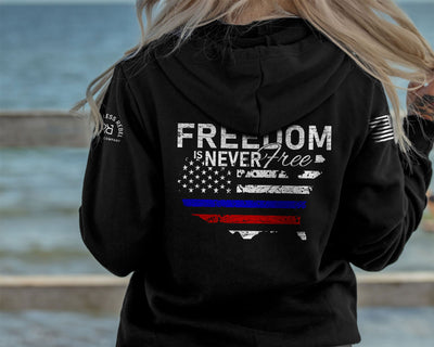 Woman wearing Solid Black Women's Freedom Is Never Free Back Design Hoodie