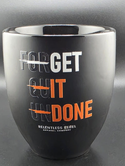 Black mug with motivational quote 'Get it Done’ on a gray background