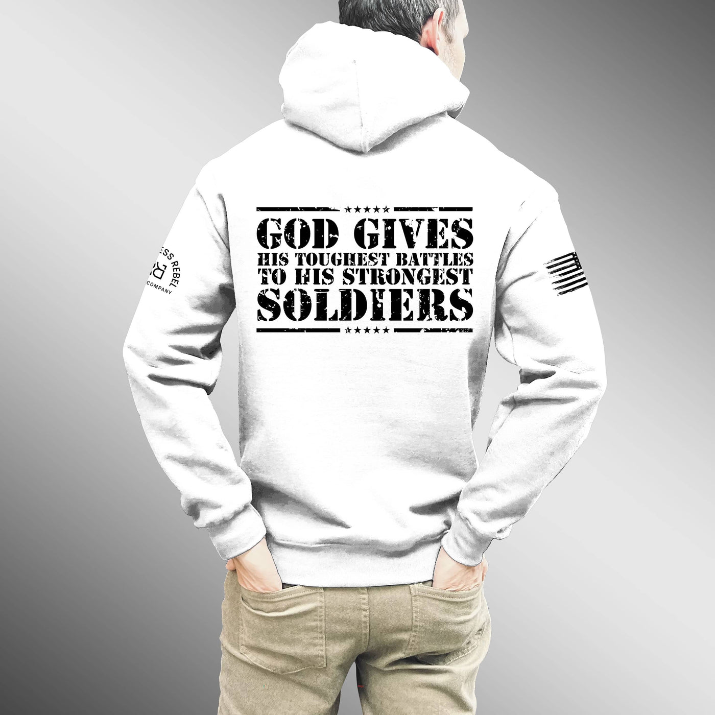 White hoodie with motivational text on the back, worn by a person against a gray background
