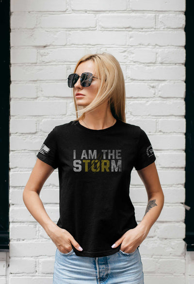 Woman wearing Solid Black Women's I Am The Storm Front Design Tee