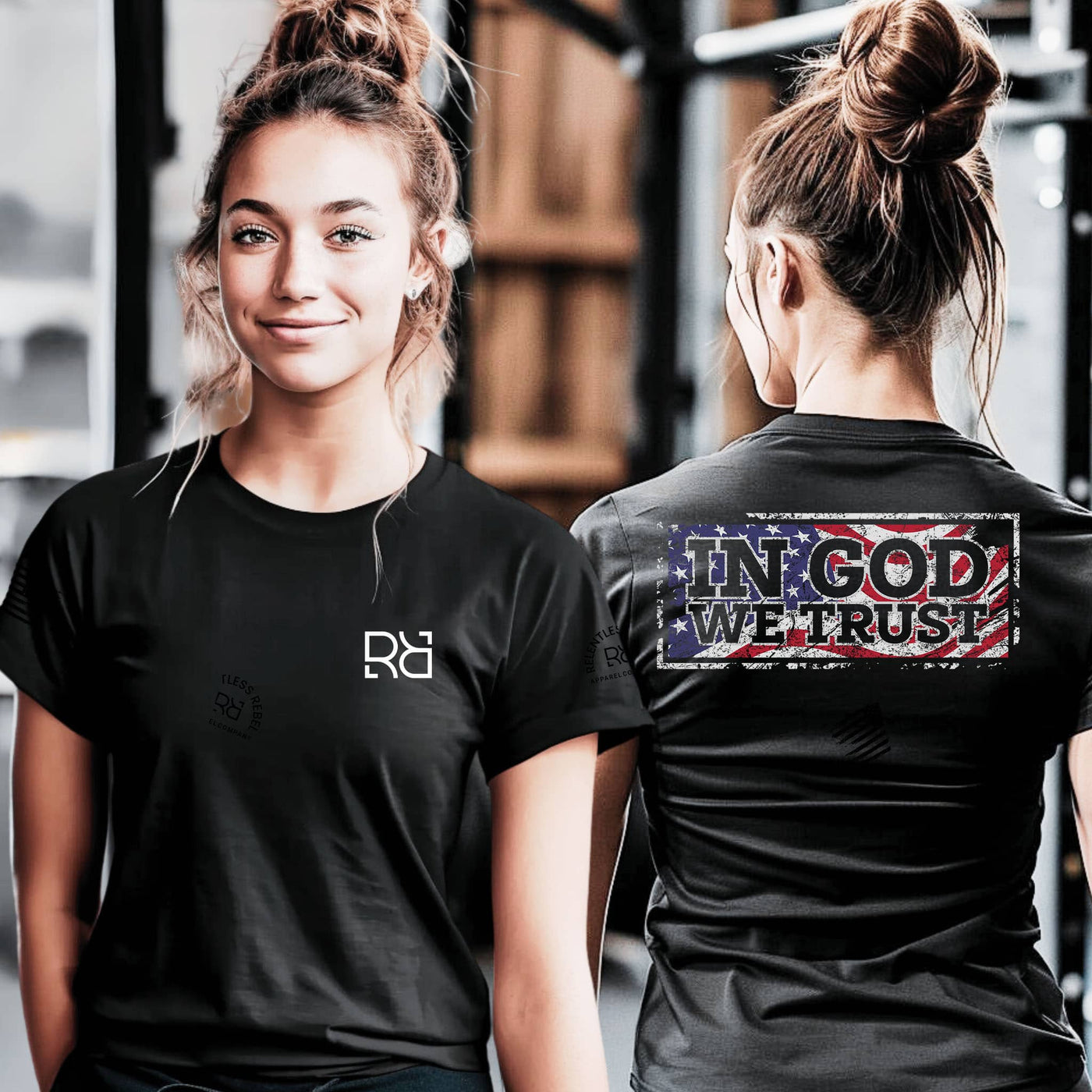 Two people wearing black t-shirts, one with a logo on the front and the other with 'IN GOD WE TRUST' on the back.