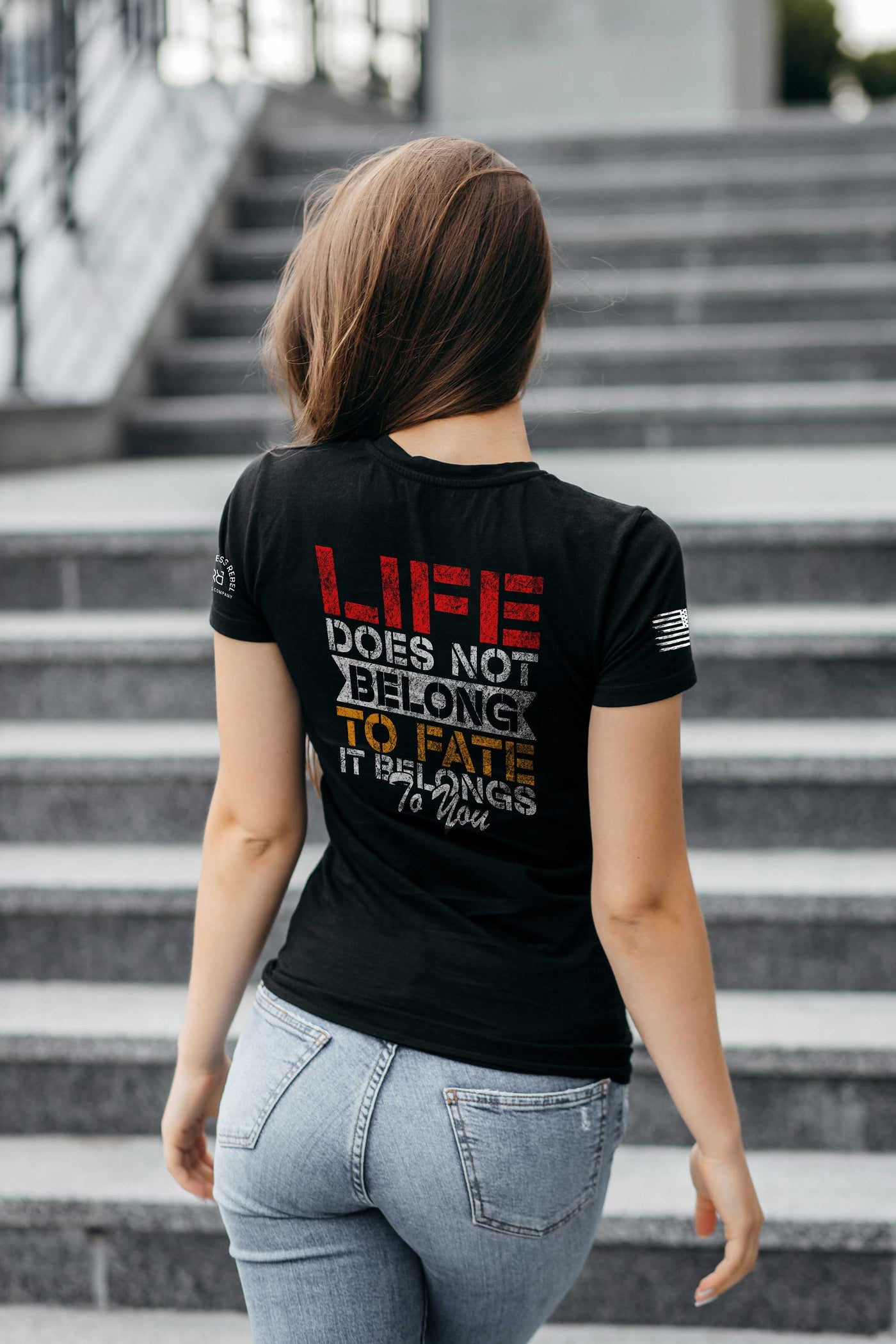 Woman wearing Black Women's Life Does Not Belong To Fate - It Belongs to You Back Design Tee