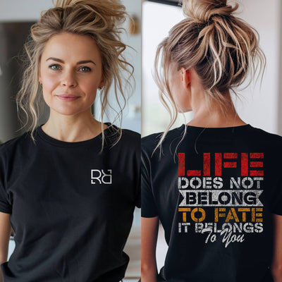 Woman wearing a black t-shirt with a logo on the front and motivational quote on the back.