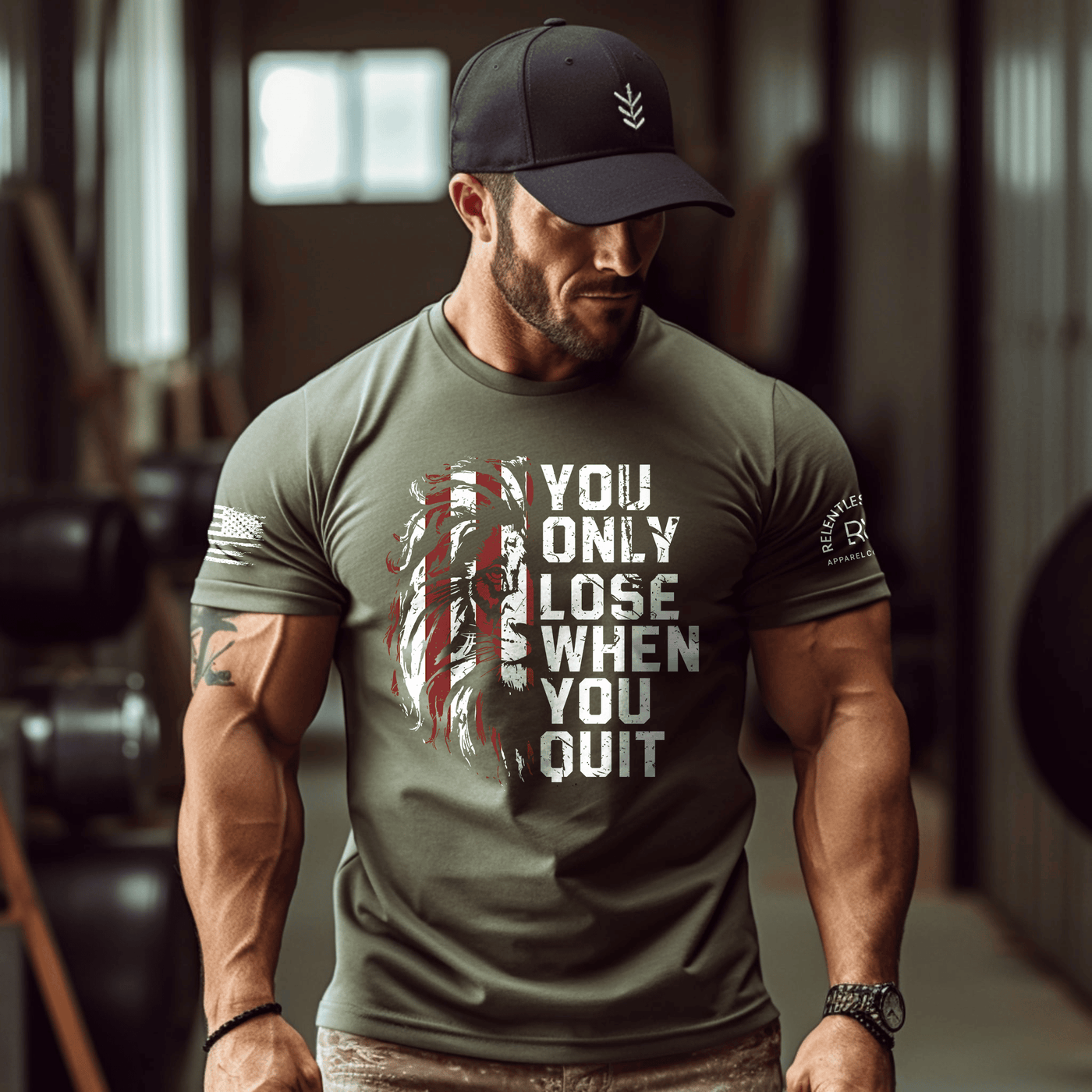 Man wearing a motivational t-shirt in a gym setting