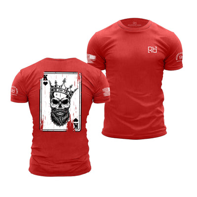 Red t-shirt with skull and card design on front, and logo on sleeve, on white background
