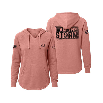 Pink hoodie with 'I AM THE STORM' text on the back, displayed from front and back views.