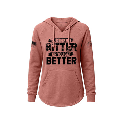 Pink hoodie with motivational text on a white background