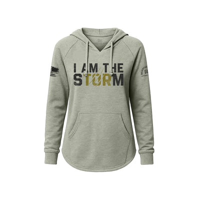 Sage hoodie with 'I AM THE STORM' text on a white background
