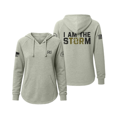 Sage hoodie with 'I AM THE STORM' text on the back, displayed from front and back views.