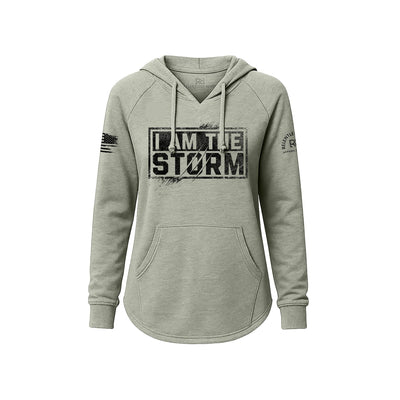 Sage hoodie with 'I am the Storm' text on a white background