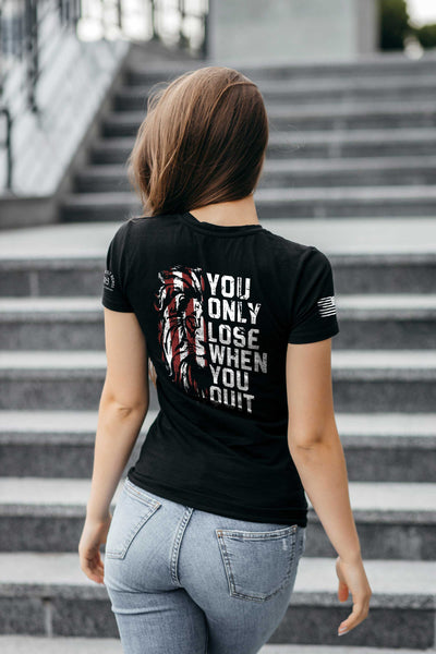 Woman wearing Solid Black Women's You Only Lose When You Quit Back Design Tee