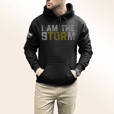 Man wearing Solid Black Men's I Am The Storm Front Design Heavyweight Hoodie