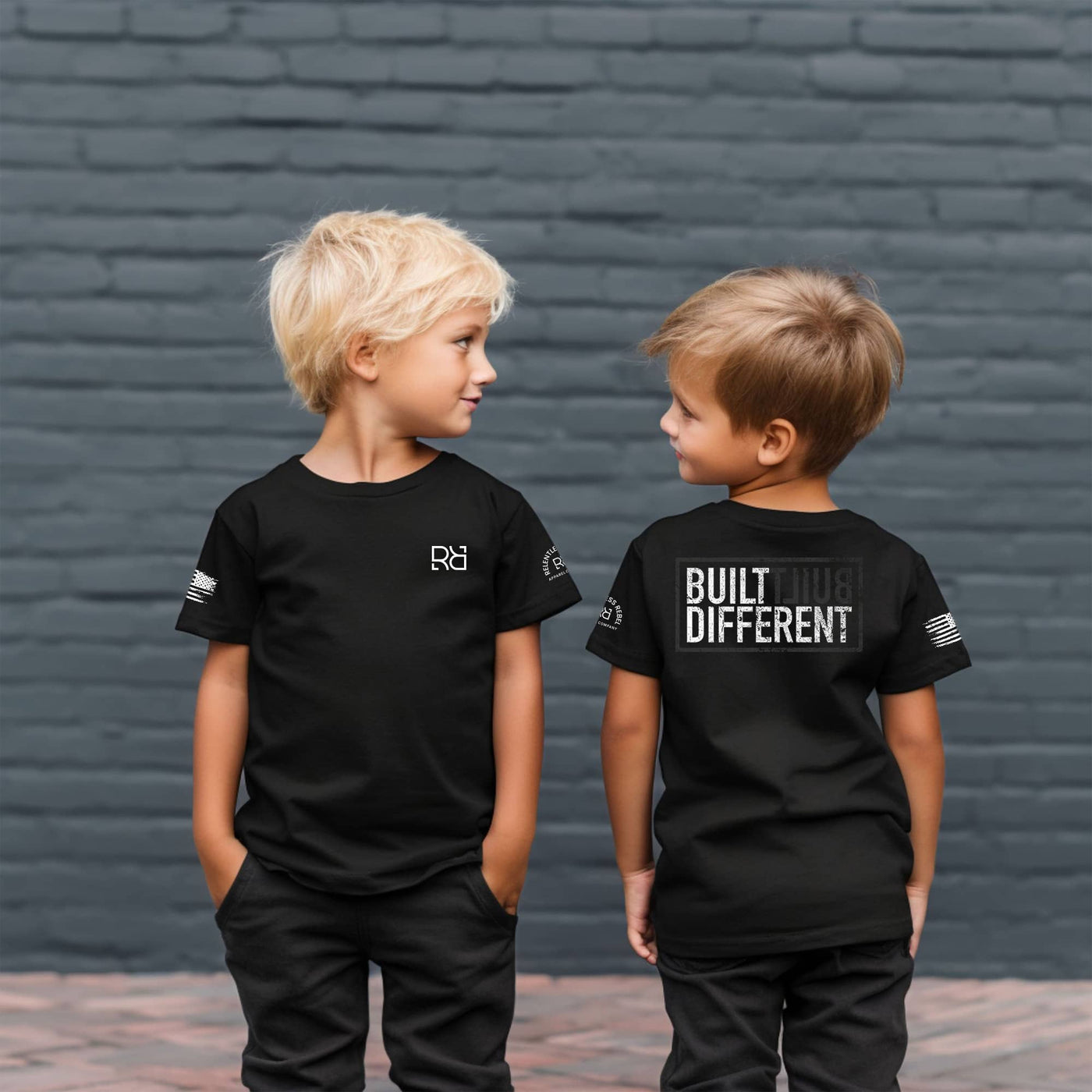 Boys wearing Solid Black Youth Built Different Back Design Tee
