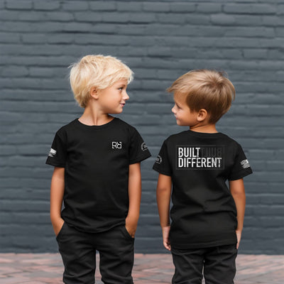 Boys wearing Solid Black Youth Built Different Back Design Tee