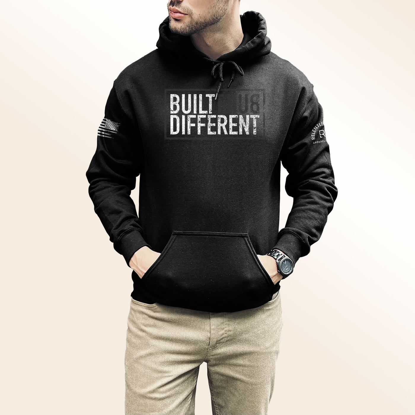 Man wearing Built Different front design hoodie