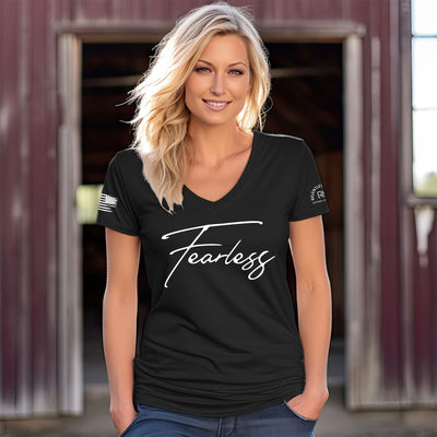Woman wearing Solid Black Women's Fearless Front Design V-Neck Tee