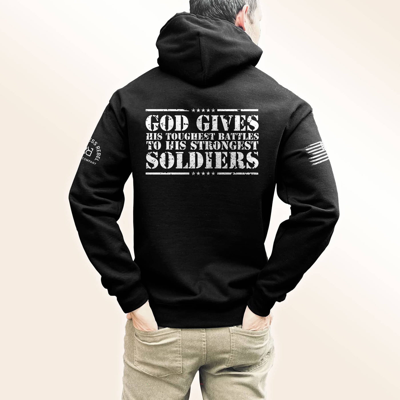 Man wearing Solid Black Men's God Gives His Toughest Battles Back Design Hoodie