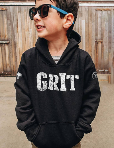 Boy wearing Solid Black Youth Grit Front Design Hoodie