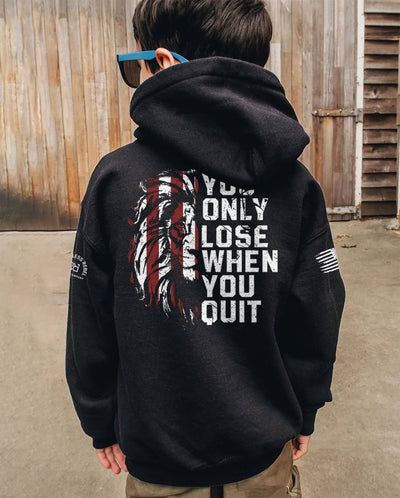 Boy wearing Solid Black Youth You Only Lose When You Quit Back Design Hoodie