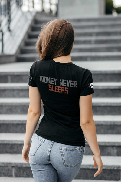 Woman wearing Solid Black Women's Money Never Sleeps Back Design Tee