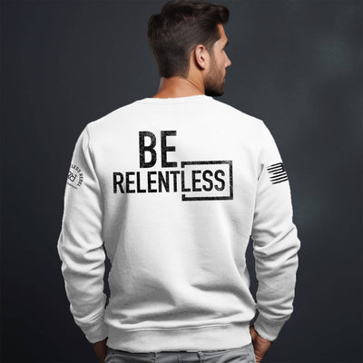 Man wearing Relentless White Men's Be Relentless Back Design Sweatshirt