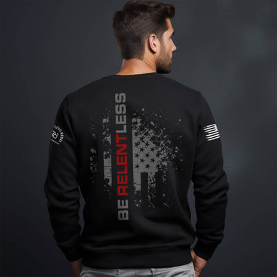 Man wearing Solid Black Be Relentless Back Design Sweatshirt