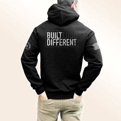 Man wearing Solid black back design men's Built Different hoodie