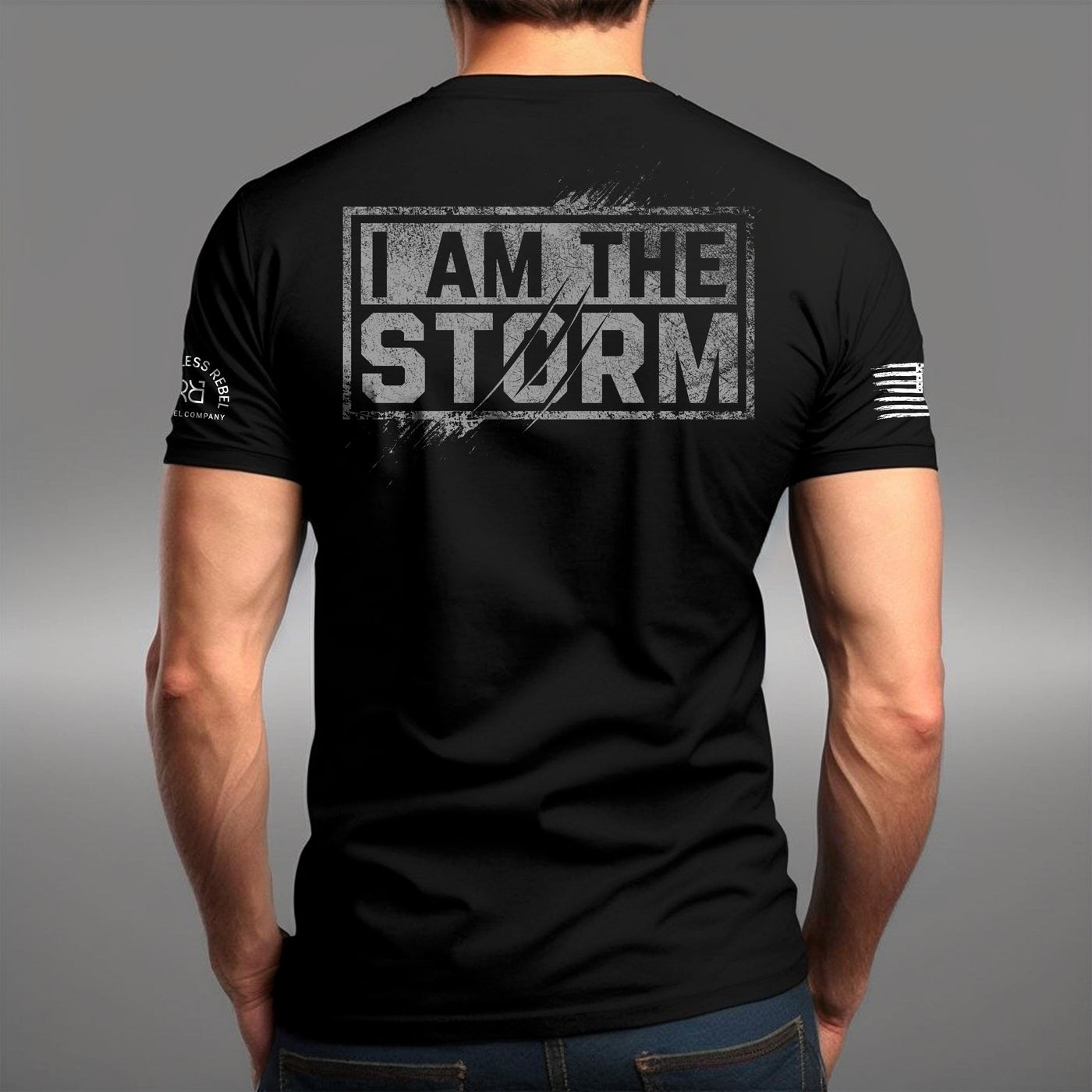 Man wearing Solid Black Men's I Am The Storm Back Design Tee