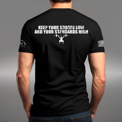 Man wearing Solid Black Men's Keep Your Squats Low and Your Standards High Back Design Tee
