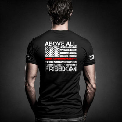 Man wearing Solid Black Men's Above All Freedom Back Design Tee