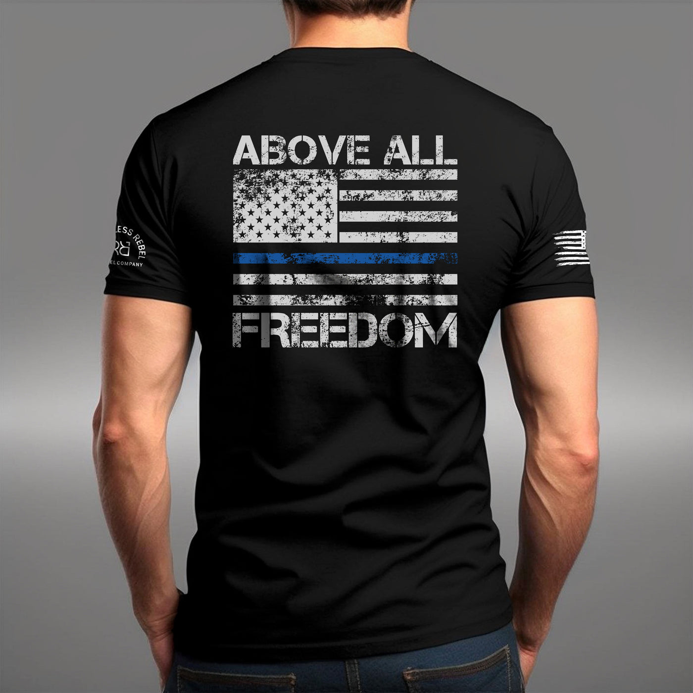 Man wearing Solid Black Men's Above All Freedom Back Design Tee