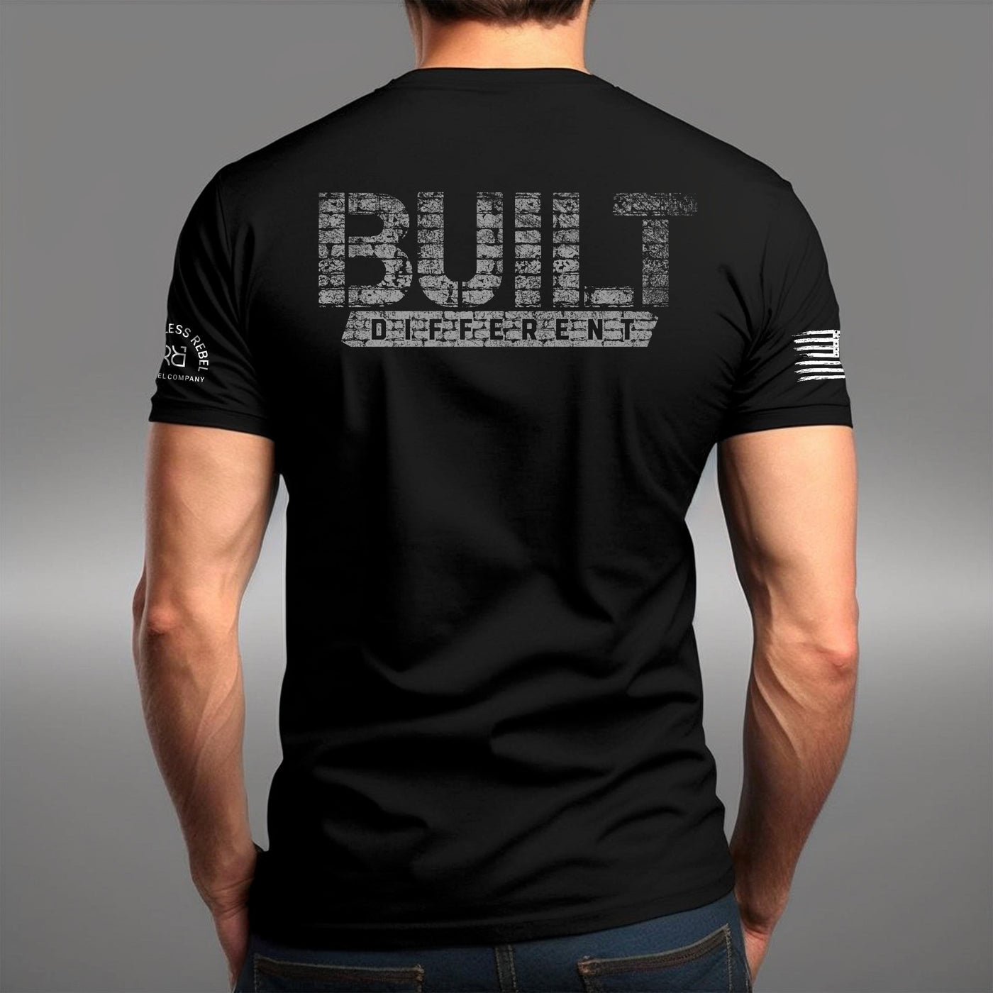 Man wearing Built Different brick design t-shirt