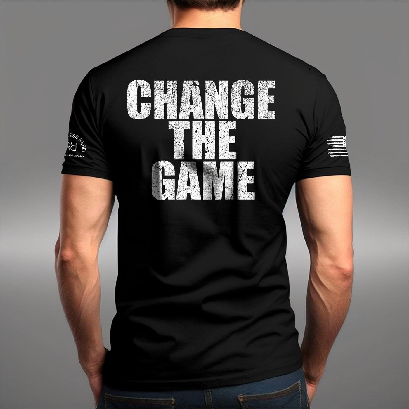 Man wearing Solid Black Men's Change the Game Back Design Tee